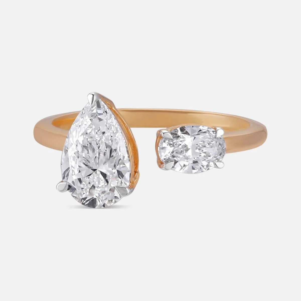 Golden Oval and Pear Bypass Rings